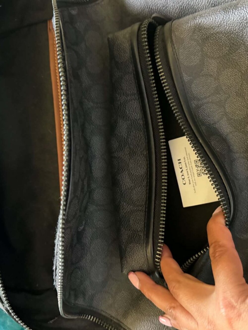 Black leather coach backpack